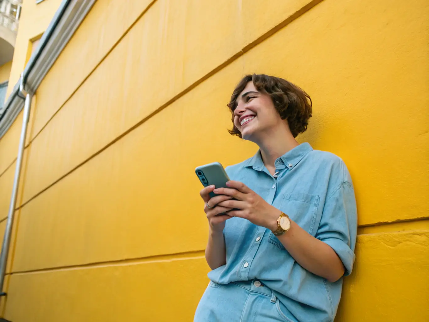 A person answering an intercom call on their mobile phone, showcasing the convenience of remote communication.